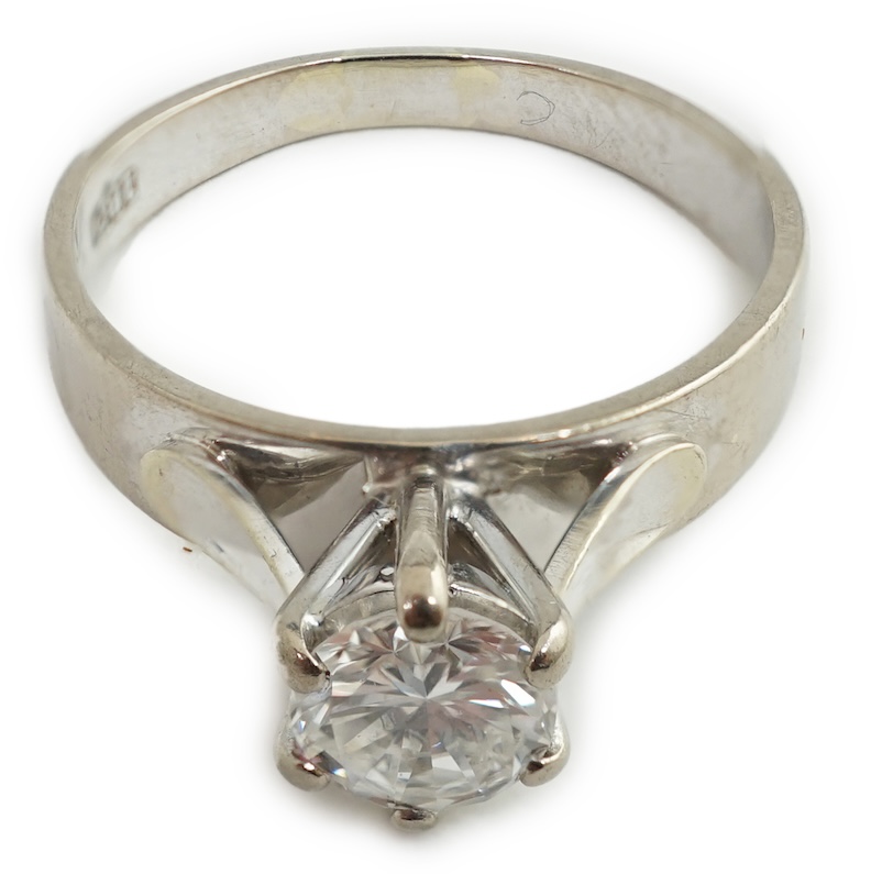 A late 20th century 18ct white gold and solitaire diamond set ring